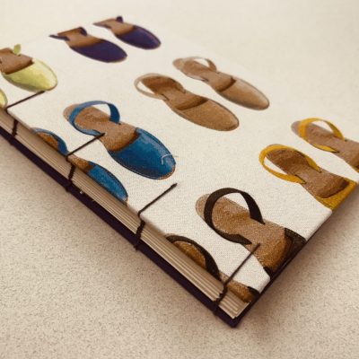 Cuaderno cosido visto